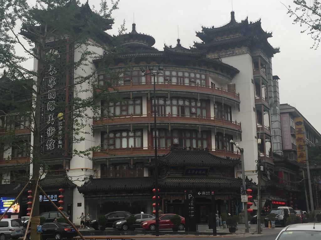 Nanfang Hotel - XI Mutou Shi Xian Bagian luar foto